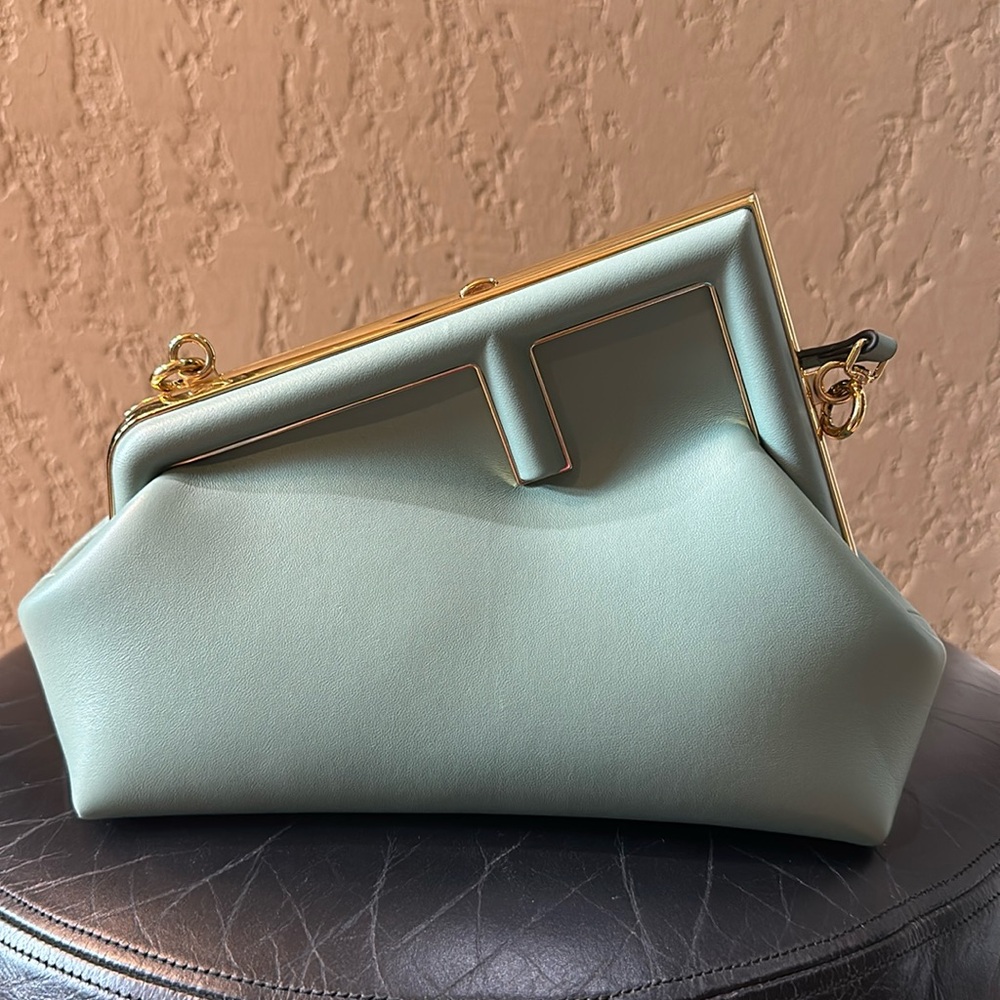 Fendi first in beautiful leather green color excellent condition.small size